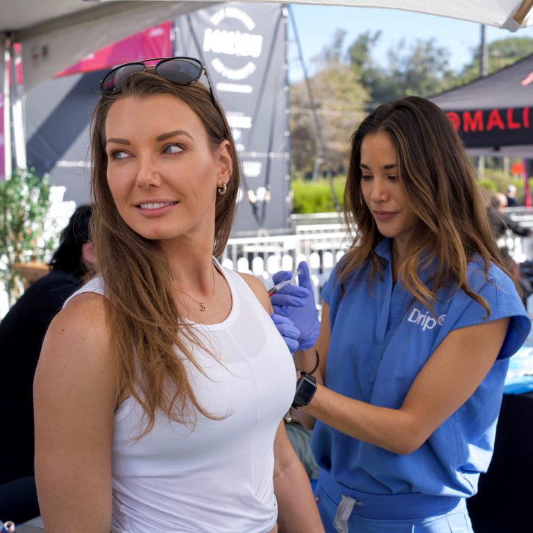 IV Therapy Nurse Giving B12 Shot to Client in Malibu