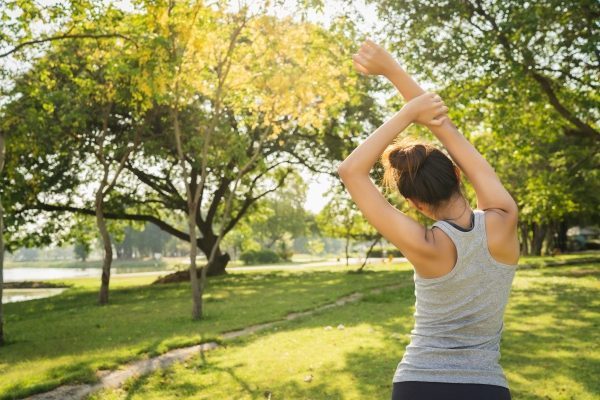 healthy-young-asian-runner-woman-warm-up-body-stretching-before-exercise-yoga